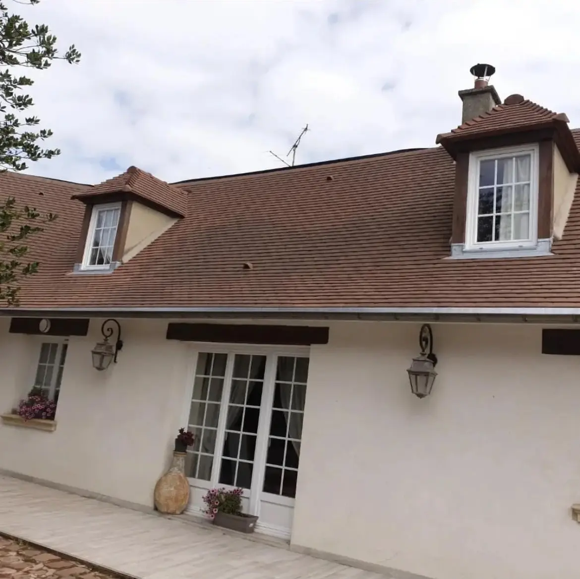 Toiture en tuiles rénovée par Génération Rénovation